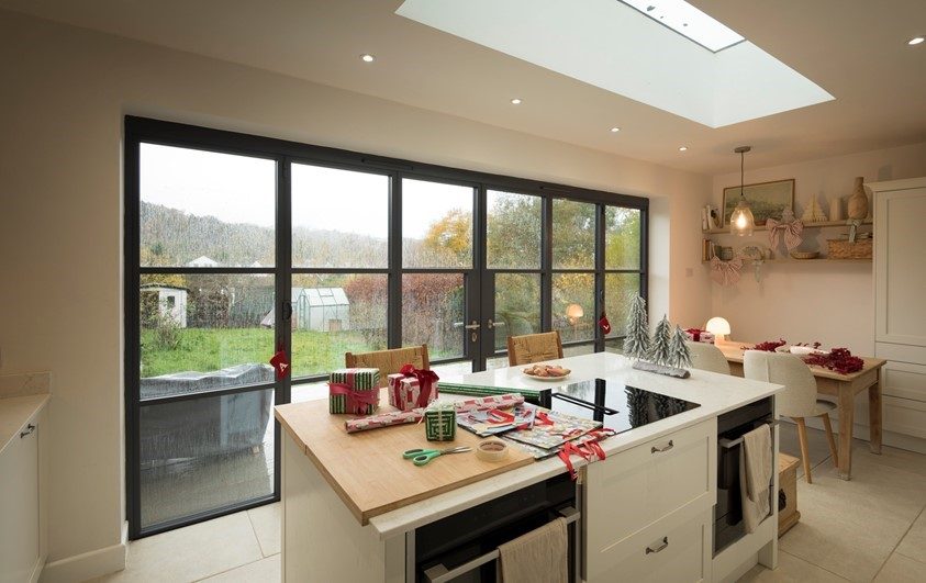 Slim-sightline Origin aluminium glazing across the rear of a kitchen extension