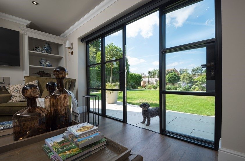 Origin aluminium doors with a view across the garden