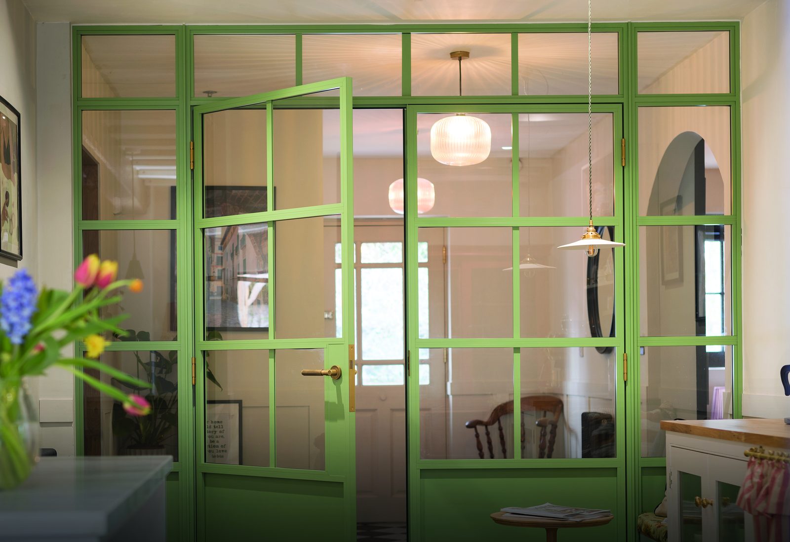 Origin internal aluminium glazed screen used as a room divider