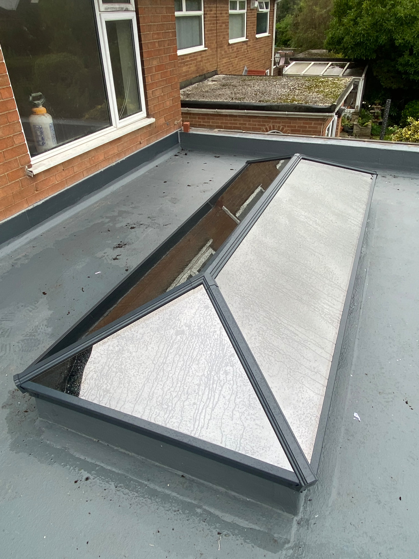 Side profile of a grey Korniche aluminium roof lantern