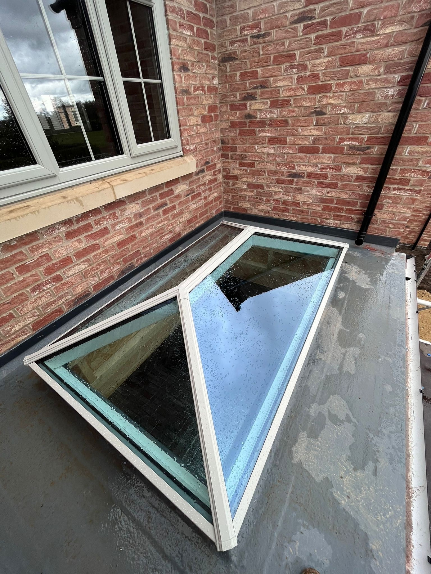 Agate grey Korniche roof lantern on a residential flat roof